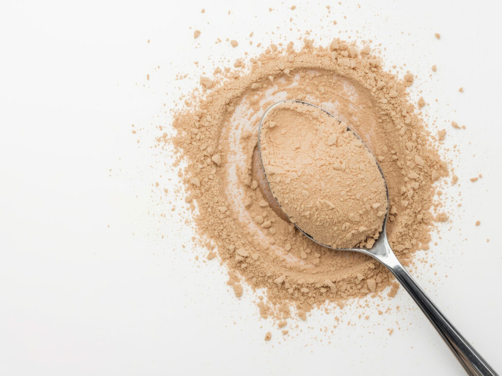 Powdered dietary supplement with a spoon